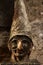 Pulcinella mask. Bronze sculpture of the typical mask of Campania and Naples