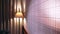 Pull Back Shot of A Decorative wall in a luxurious hotel room with Night Lamps in focus