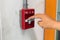 The pull handle fire alarm switch.