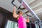 Pull ups Pull-up exercise workout girl at gym