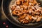 Pulled jackfruit getting sauteed in a pan the fruit is used as mock chicken in vegan nutrition