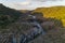 Pulo do Lobo waterfall drone aerial view with river guadiana and beautiful green valley landscape at sunset in Mertola Alentejo,