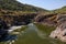 Pulo do Lobo or wolf`s leap waterfall and cascade on river Guadi