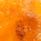 Pulp ripe persimmons as a background. macro