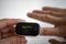 Pulse Oximeter Measure Pulse Rate And Oxygen Saturation Level On Male Finger