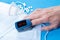 Pulse oximeter measuring oxygen saturation in blood