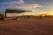 Puma gas station located on a dirt road in the Namib Desert at sunrise