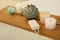 Pumice stone and decor on wooden caddy in bathroom