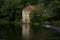 Pump house beside a quite river bank