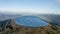 Pumped water storage hydroelectric plant reservoir aerial drone view