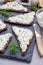 Pumpernickel bread with feta, cream cheese, rosemary, lemon, garlic dip