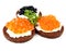 Pumpernickel bread with salmon, trout and sturgeon caviar
