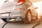 Pumping gas fuel car at oil station. Woman hand refuel petrol nozzle tank. Refueling transportation and Automotive