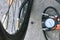 Pumping up a bicycle tire using an electric air car compressor