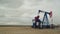 Pumpjack Oil Pump operating on natural gas in the field pumping from the oil well