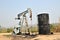Pumpjack pumping crude oil from oil well