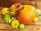 Pumpkin. Autumn still life with pumpkins and bright leaf on wooden table