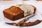 Pumpkin bread loaf over white wooden background