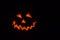 Pumpkin carved into traditional Halloween Jack O\'Lantern