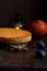 Pumpkin cheesecake, pumpkin, vanilla on wooden background