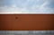 Pumpkin-colored Wall with Cloudscape