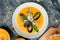 Pumpkin cream soup with mussels, blue cheese, mold. Delicious balanced food concept. top view