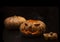Pumpkin that is cut into a ghost face for Halloween, placed in a scary atmosphere, with candles shining in the dark. For use on Ha