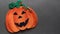 Pumpkin felt applique on a gray background Halloween space for text