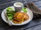 Pumpkin fritters, fresh spinach and natural yoghurt.