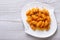 Pumpkin gnocchi with sauce and spices, horizontal top view