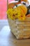 Pumpkin, gourds and yellow mums in basket