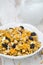 Pumpkin granola with dried fruit and seeds closeup