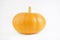 Pumpkin isolated on white with shadow and subtle reflection. Ripe orange yellow pumpkin. Harvest