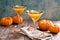 Pumpkin martini cocktail with black salt rim