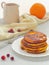 Pumpkin pancakes with caramel sause and cranberries