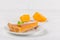 Pumpkin pie Homemade dessert Autumn delicious. Piece of traditional cake with cut pumpkin on white wooden background. Vegetarian f