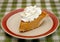 Pumpkin pie with whipped cream