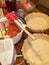 Pumpkin Pie in the Works in Farmhouse Kitchen, two empty pie crusts