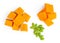 Pumpkin pieces cut in a cube slices isolated on white background. Diced Pumpkin, close up. Top view