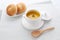 pumpkin potage soup isolated on table
