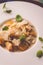 Pumpkin and potatoes gnocchi with mushrooms sauce