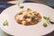 Pumpkin and potatoes gnocchi with mushrooms sauce