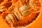 Pumpkin pulp and seeds close-up organic food background