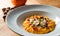 Pumpkin risotto with sun-dried tomatoes