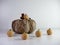 Pumpkin roll cake balls truffle like mini dessert lined up with a wooden fall pumpkin in the background, delicious dessert for the