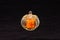 Pumpkin shaped candle holder three and a half inches tall, three and a half wide
