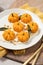 pumpkin shaped gnocchi with brown butter parmesan sauce