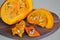 Pumpkin slices with seeds. Orange coloring