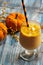 Pumpkin smoothie health drink with spices for winter