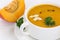 Pumpkin soup closeup with pumpkins